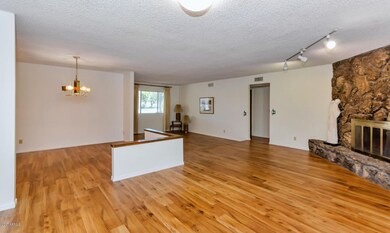 Family room w/ wood burning fireplace