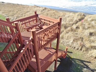 The rear stairs behind the building.