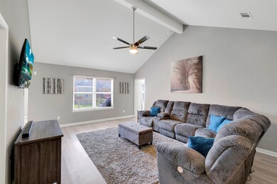 The living area has a high, vaulted ceiling.