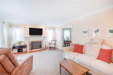 The living room with beautiful hardwood floors, a 
