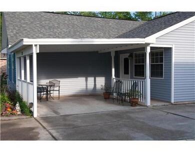 Patio/Deck. Relax under the large covered front po