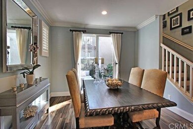 Light and bright dining room opens to private pati