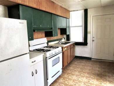 Unit 1 Kitchen ( 14x09) includes gas stove and ref