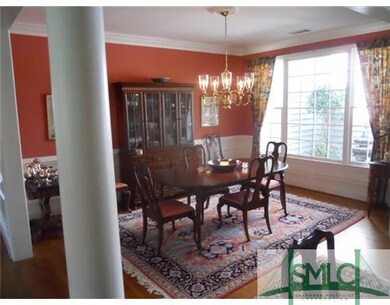 Dining Room. This elegant Dining Room has a column