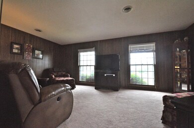 Comfortable Den overlooking your front yard... 