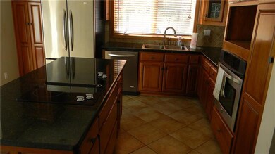 Kitchen.  Jenn Air in large Island, Stainless Appl
