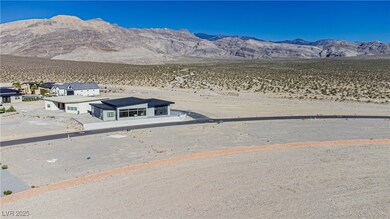 View of mountain backdrop featuring a desert landscape