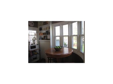Kitchen. The rounded series of windows in the kitc