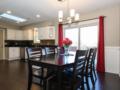 Informal dining room with sliding door that leads 