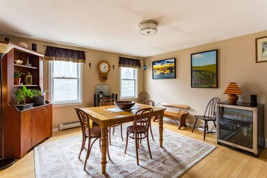 The dining area offers a great space for a large table, offering plenty of space for gatherings.