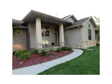 Porch. Covered front porch with columns accented w