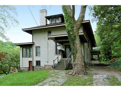 Exterior Front. The driveway abuts the side street