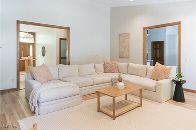 Living room with hardwood / wood-style floors