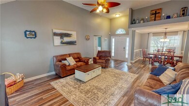 Generous Living Room with newer laminate Floors