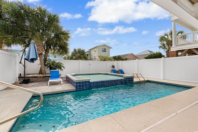 View of swimming pool featuring a patio and an in 