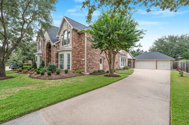 Detached 3-car garage with half bathroom.