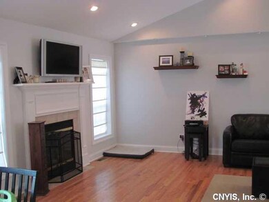 Living Room. Cathedral ceilings create a feeling o