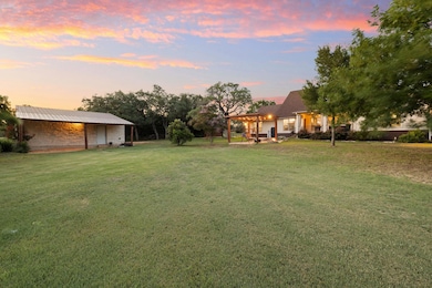Yard at dusk with a lawn