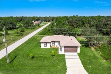 View from above of property featuring a forest