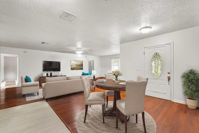 Front Entrance & Living Room (STAGED  Furniture)