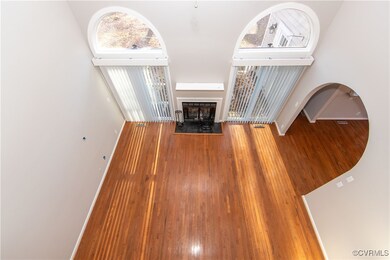 Unfurnished living room with wood-type flooring