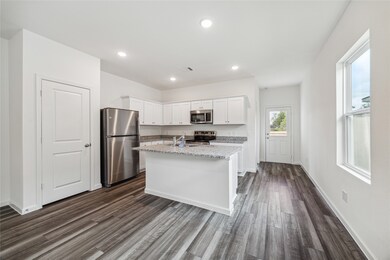 10127 Tiger Flower Ln, Houston, TX 77016 - photo 4