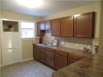 All new cabinets stainless steel kitchen sink tile