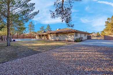 pool and covered patio to the right is gated RV pa