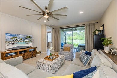 Living space with view of landscaped yard from the