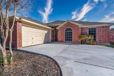oversized garage has room to keep trash cans