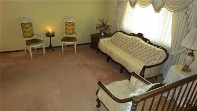 FORMAL LIVING ROOM OPENS TO DINING ROOM...