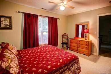Master Bedroom with Queen bed  and Dresser and mir