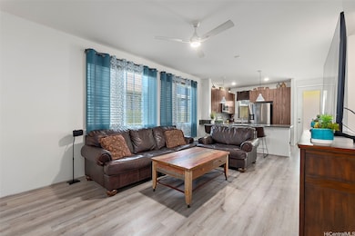 Bright and open living area with vinyl plank floor