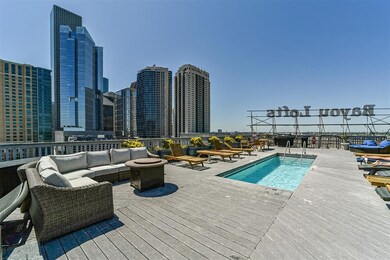Relax on the rooftop pool with breathtaking downto