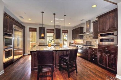  This Gorgeous Chef's Kitchen with Rich Wood Cabin