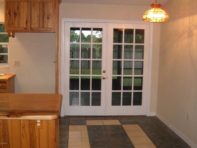 French doors to porch area