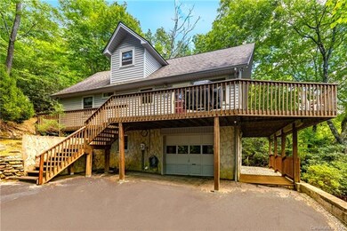 Mountain cottage with wrap-around deck