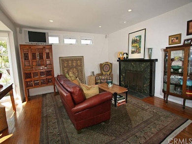Living room with custom fireplace and clear story 