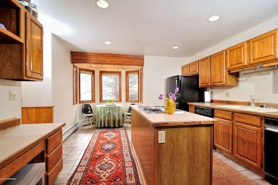 Eat in Kitchen with Bar and Desk Area