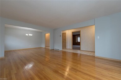 The Living Room with hardwood floor looking toward