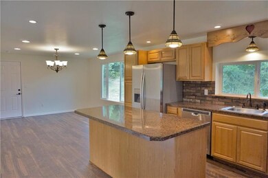 Beautiful open kitchen/dining area! Everything is 