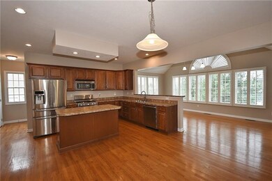 Kitchen leads to first floor laundry room and enor