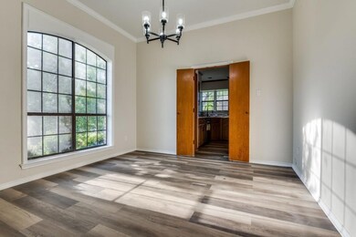 Unfurnished room with baseboards, an inviting chan
