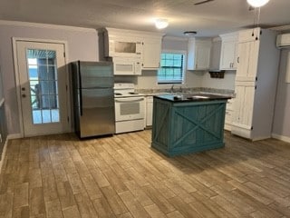 View from front door across living area & kitchen