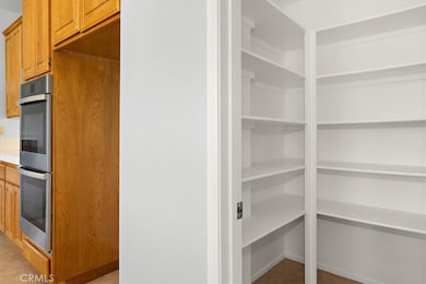 Kitchen provides a walk in pantry and double ovens