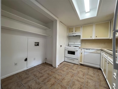 Washer/Dryer hookups in kitchen.