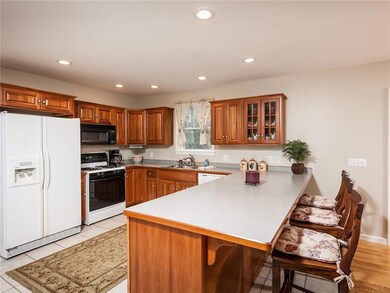 The custom cherry cabinets are...