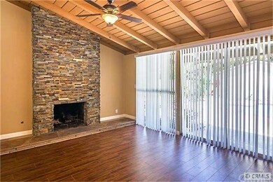 Stone floor to ceiling fireplace; Vaulted ceilings