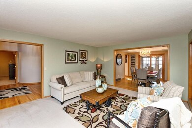 formal living room leads into formal dining room