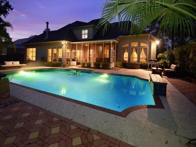 Inviting gas heated swimming pool, screened in por